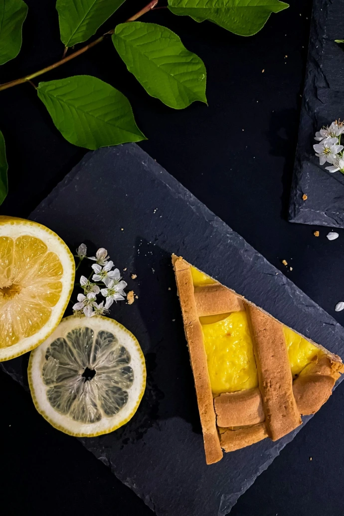 sliced lemon on black table